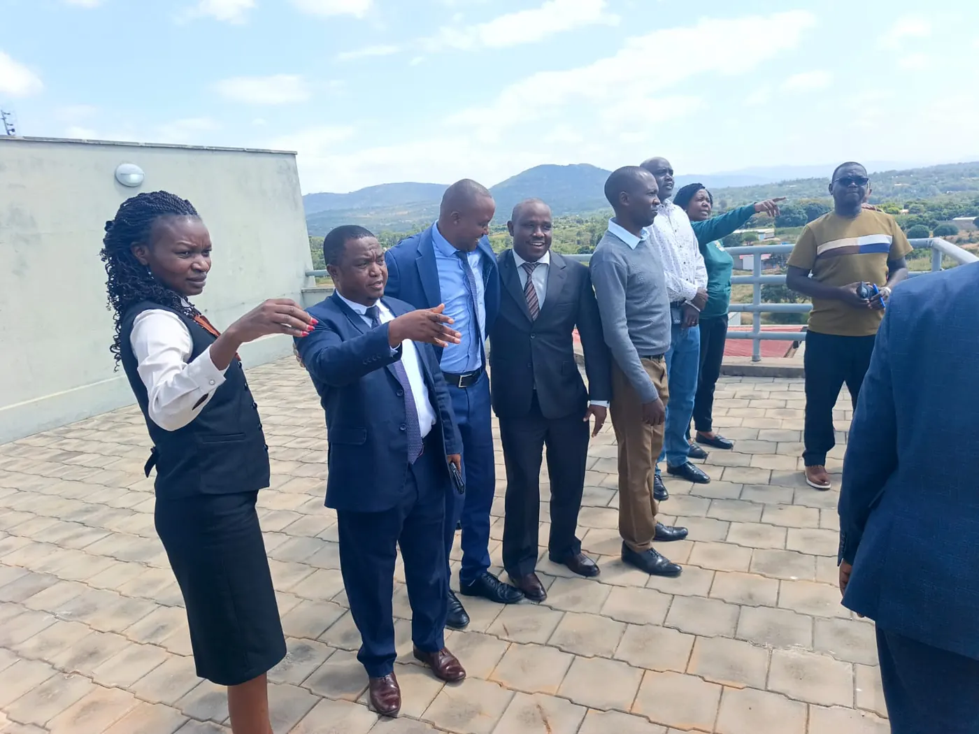 KMUA members on a courtesy call at Makueni University College, with the hills behind them